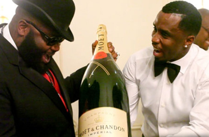 Rick Ross and Diddy super stoked about bathtub of champagne.